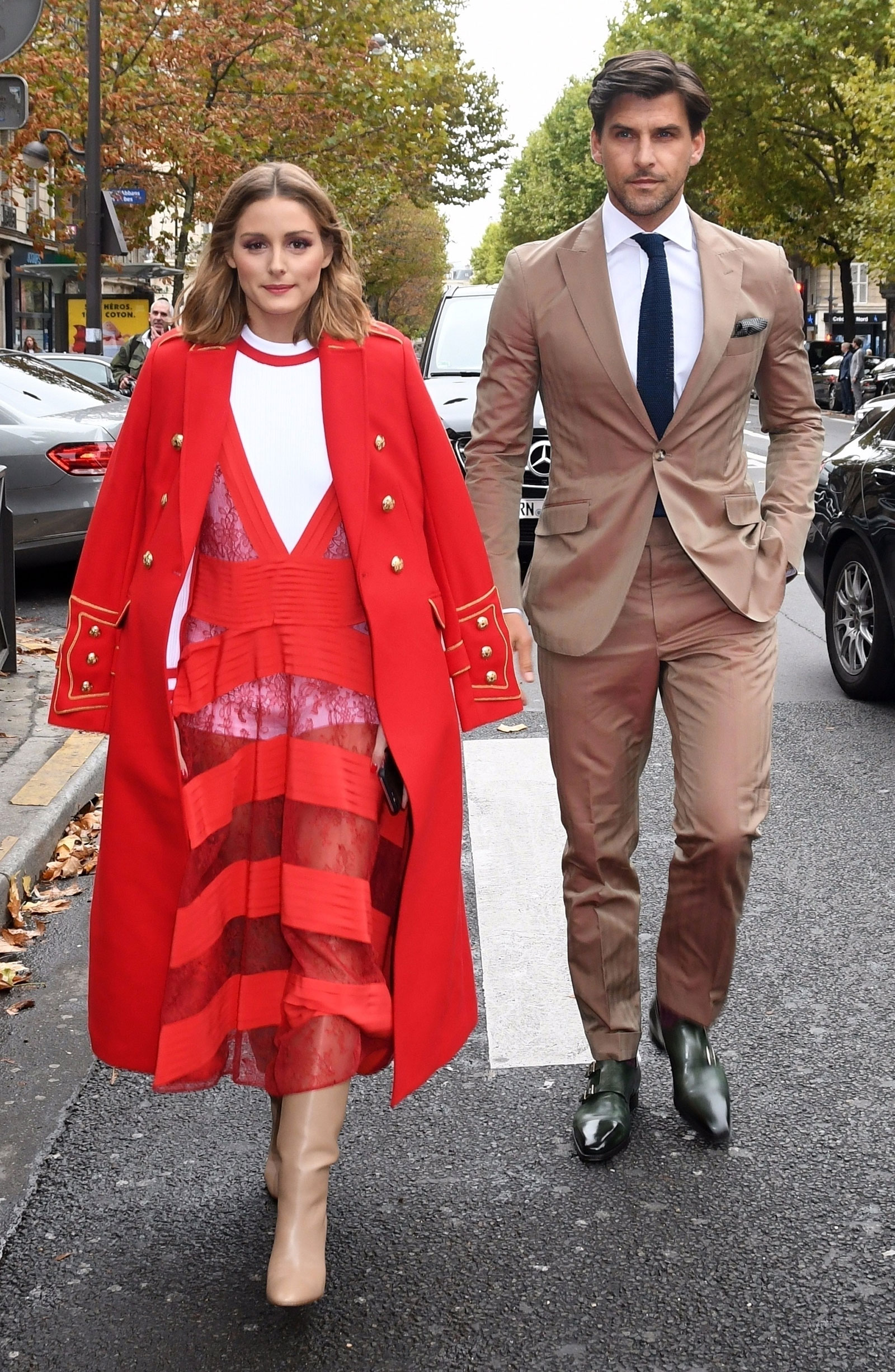 Olivia Palermo and husband Johannes Huebl are seen arriving at the Valentino fashion show in Paris during fashion week. 